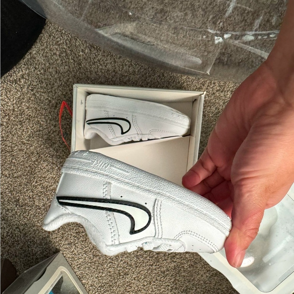 Nike White Baby Sneakers with Black Accents